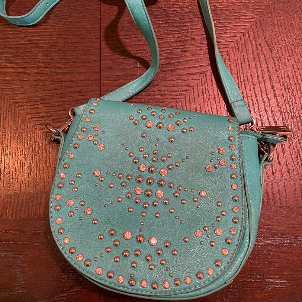 Turquoise crossbody from Charming Charlie’s.